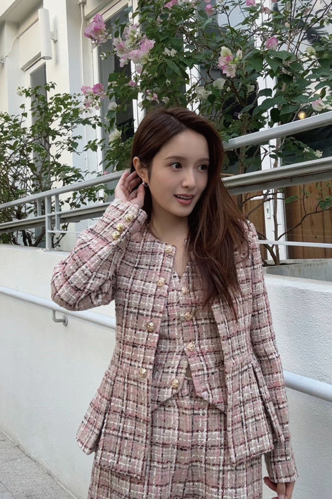 Feeling rosy in chic tweed jacket