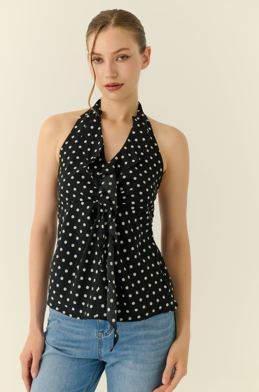 Petite pomme polka dot halter in black