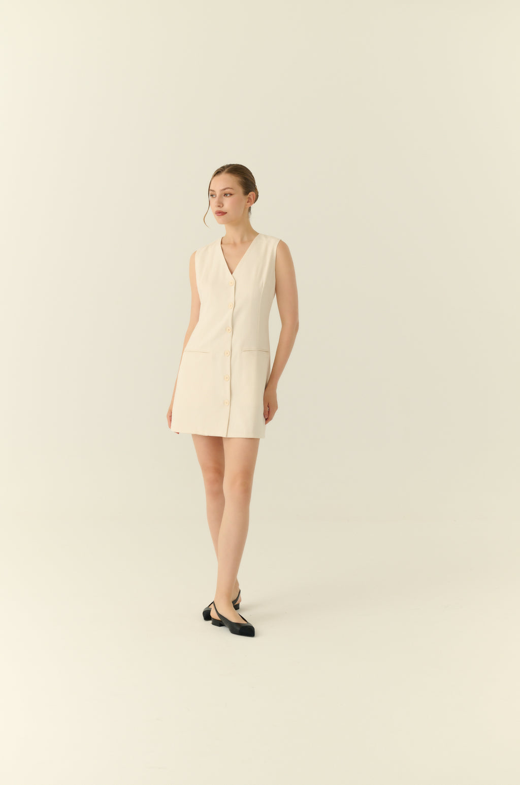 The parisian button down shift dress in beige
